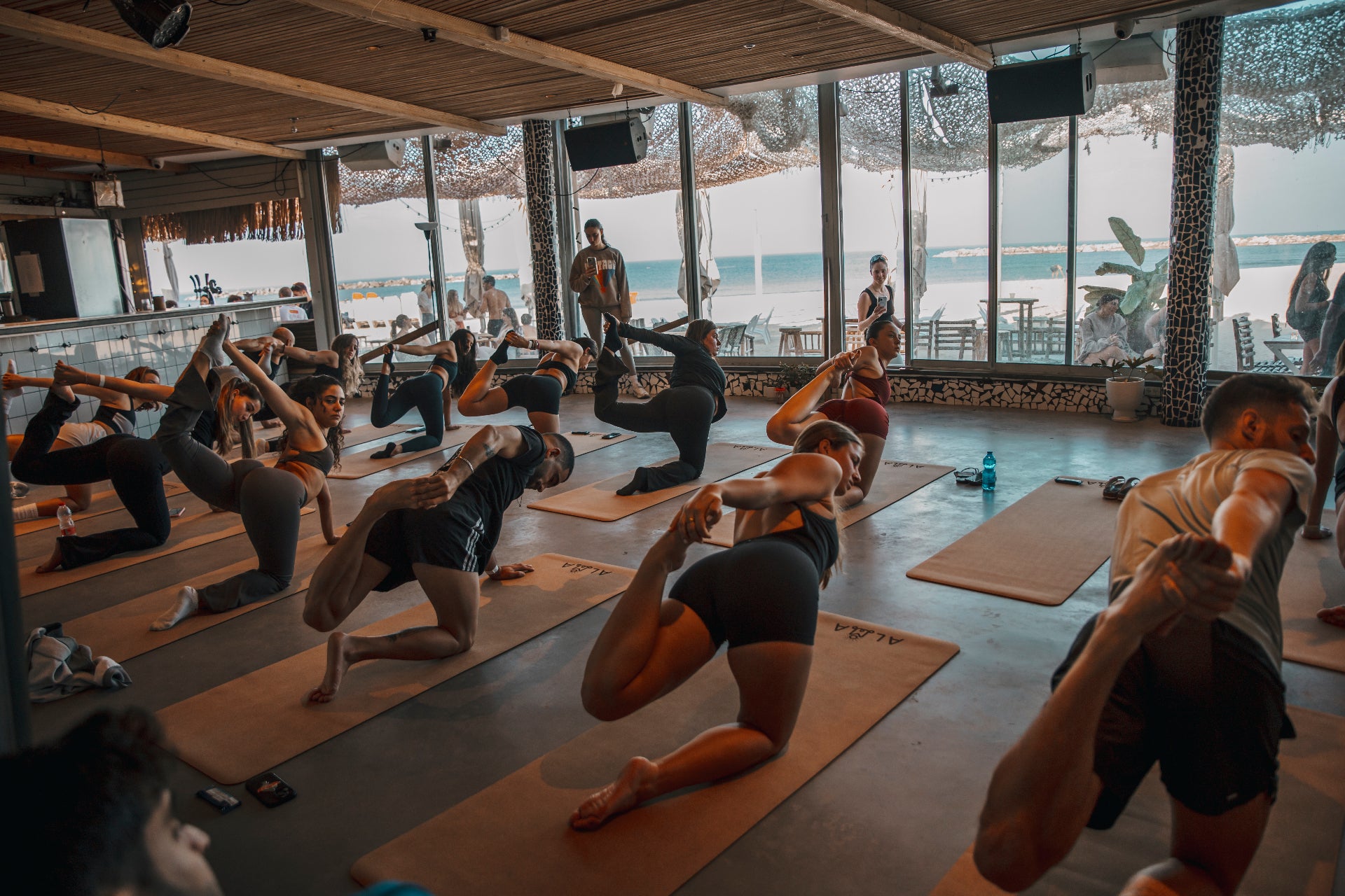 Yoga class on the beach